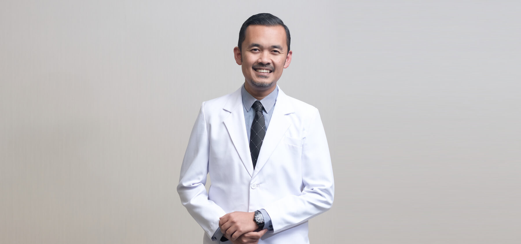 Dr. EMIL F. SJAHREZA , SpM