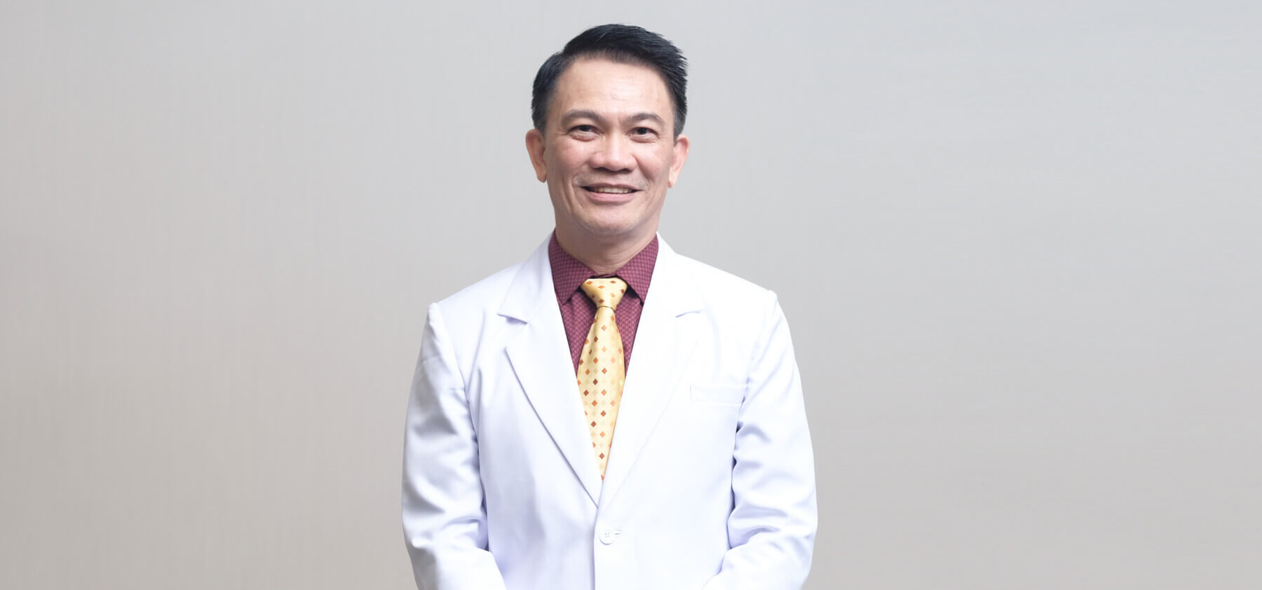 Dr. RICKY E. ROOROH , SpM